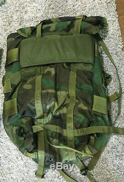 Lot of Military Gear- 3 Pant, 1 Short, 1 Shirt/Jacket sz LG, 3 Caps, 2 Bags, & more